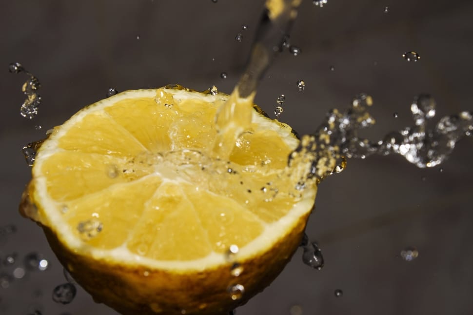 macro photography of lemon with water drops preview