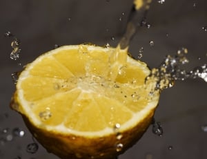 macro photography of lemon with water drops thumbnail