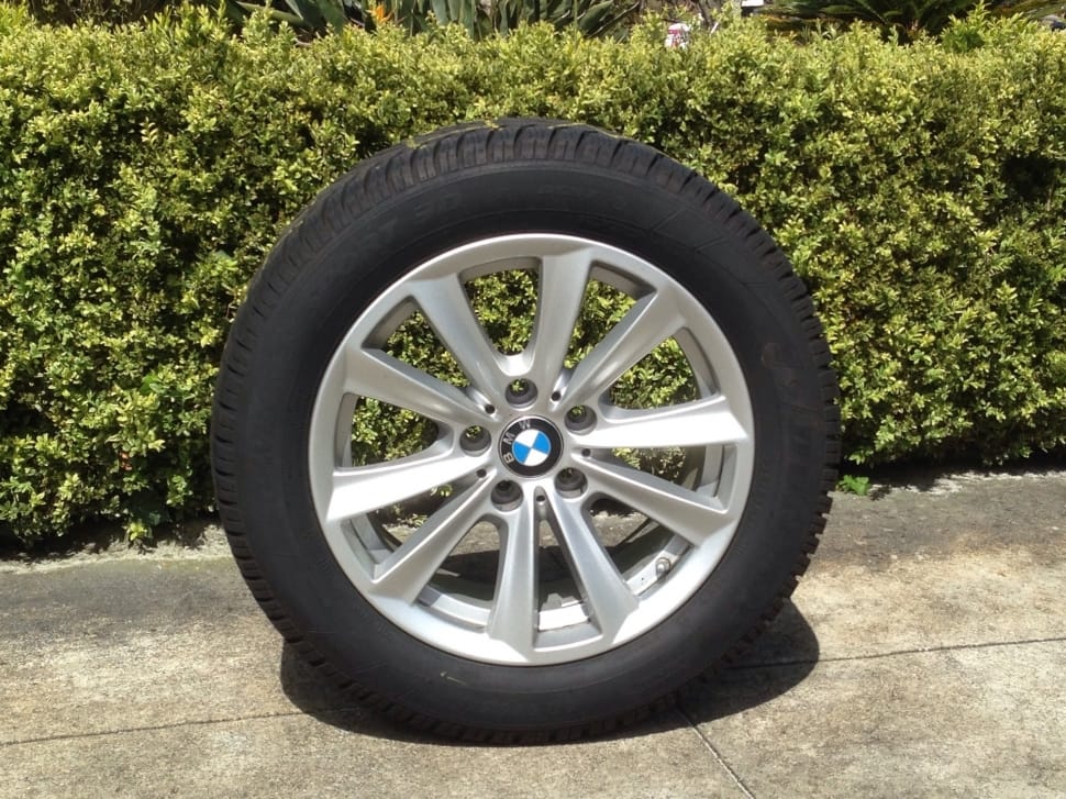 BMW automotive tire with gray 5 studs auto rim preview