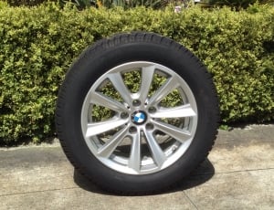 BMW automotive tire with gray 5 studs auto rim thumbnail