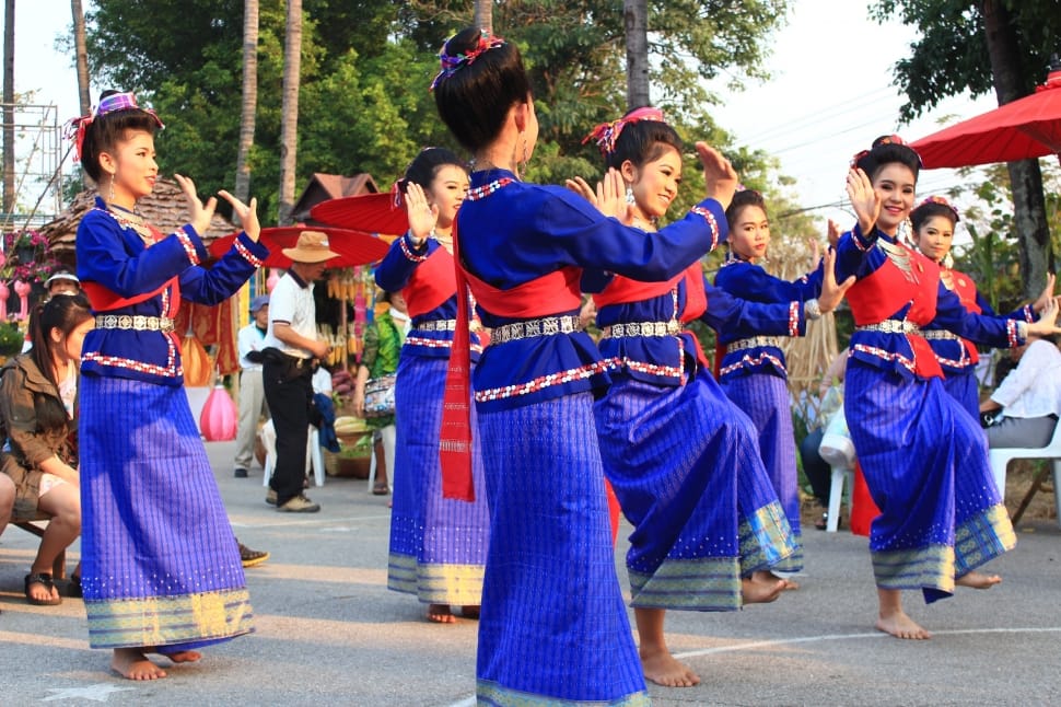 group of woman wearing blue and red long sleeve dress dancing preview