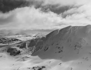 grayscale photograph of snow covered mountain thumbnail