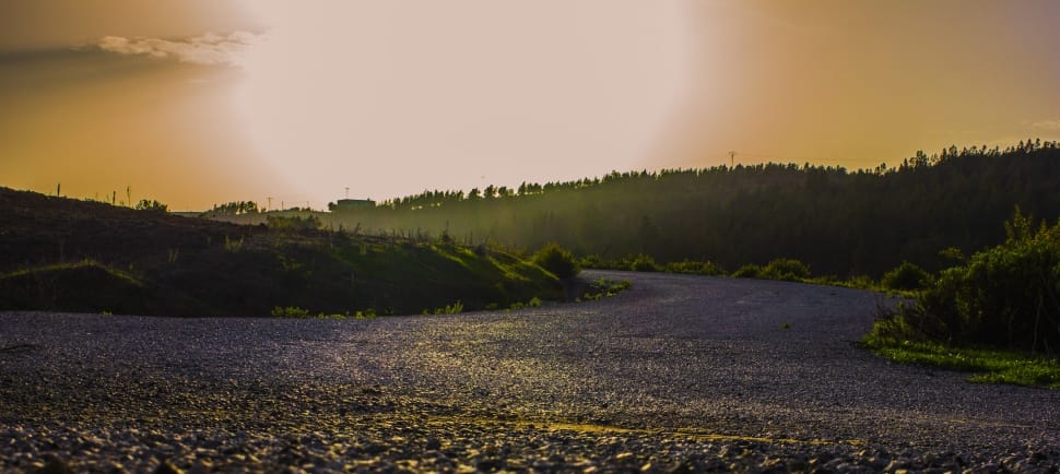 body of water in between island during golden hour preview