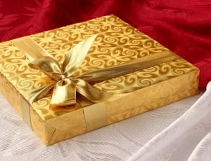 gold gift box with ribbon thumbnail