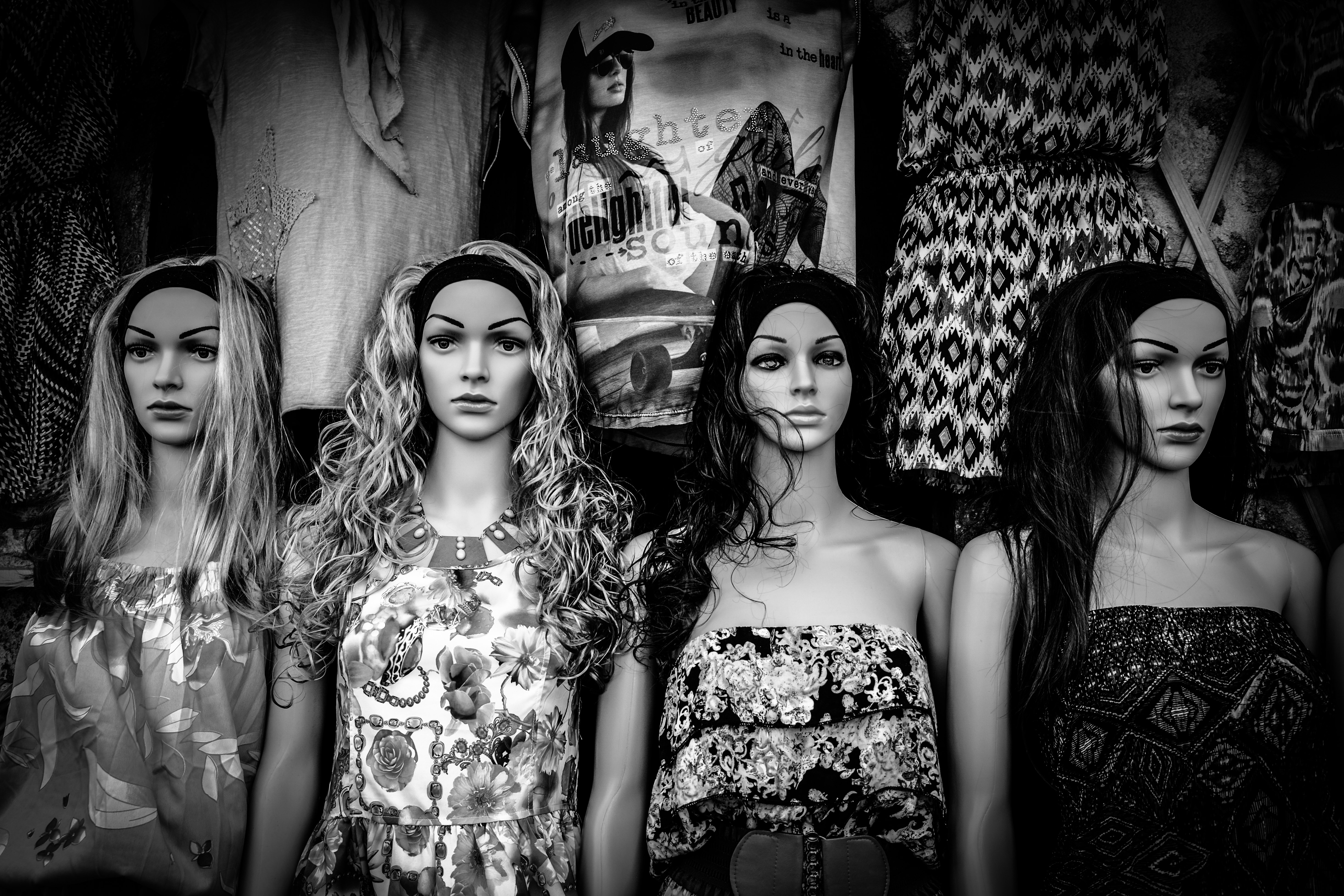 grayscale photo of female mannequins