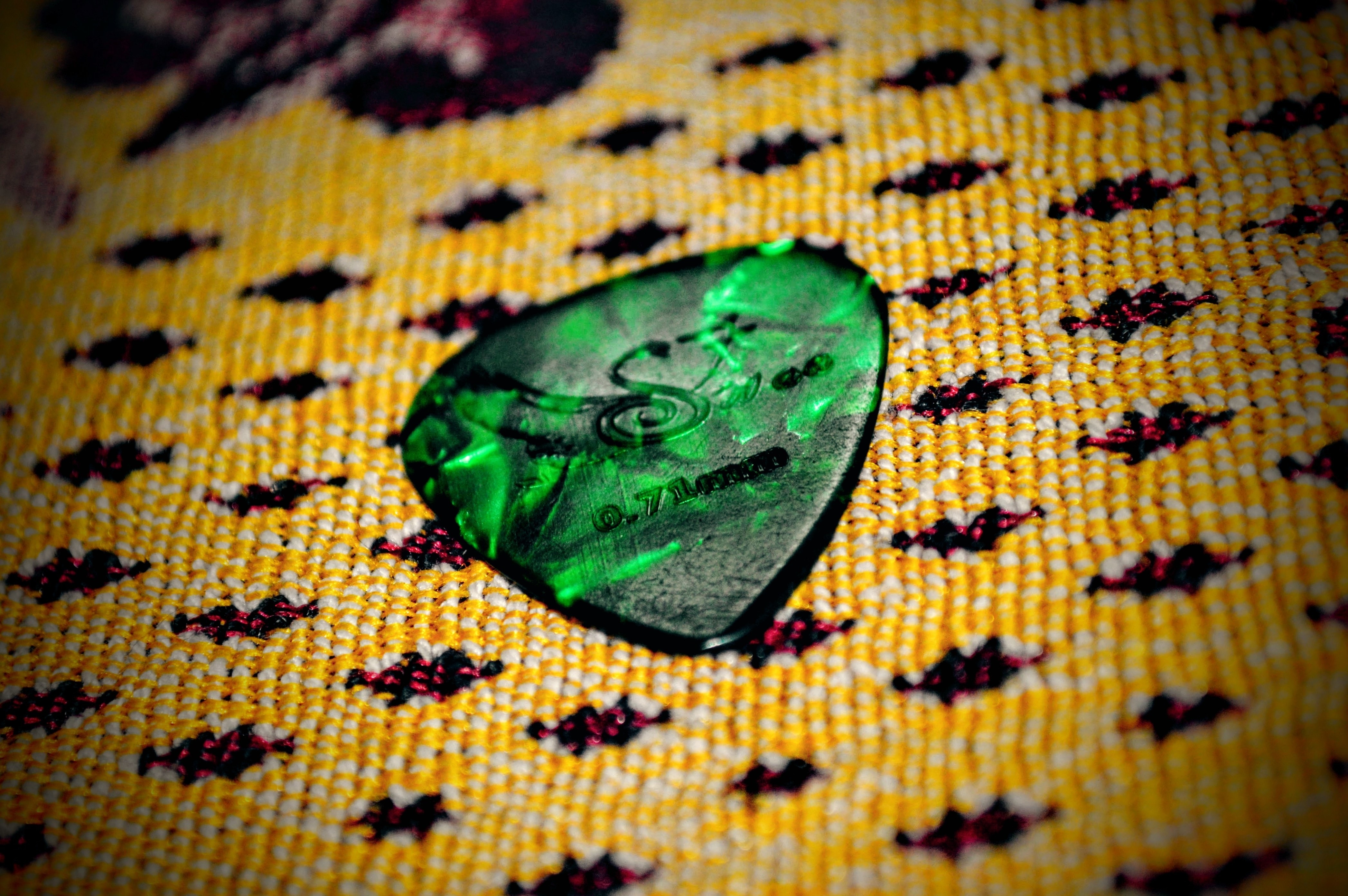green guitar pick