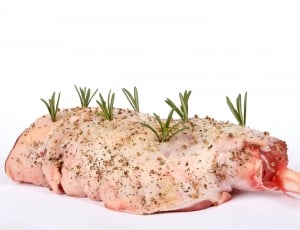 baked meat with leafs and seasonings and spices thumbnail