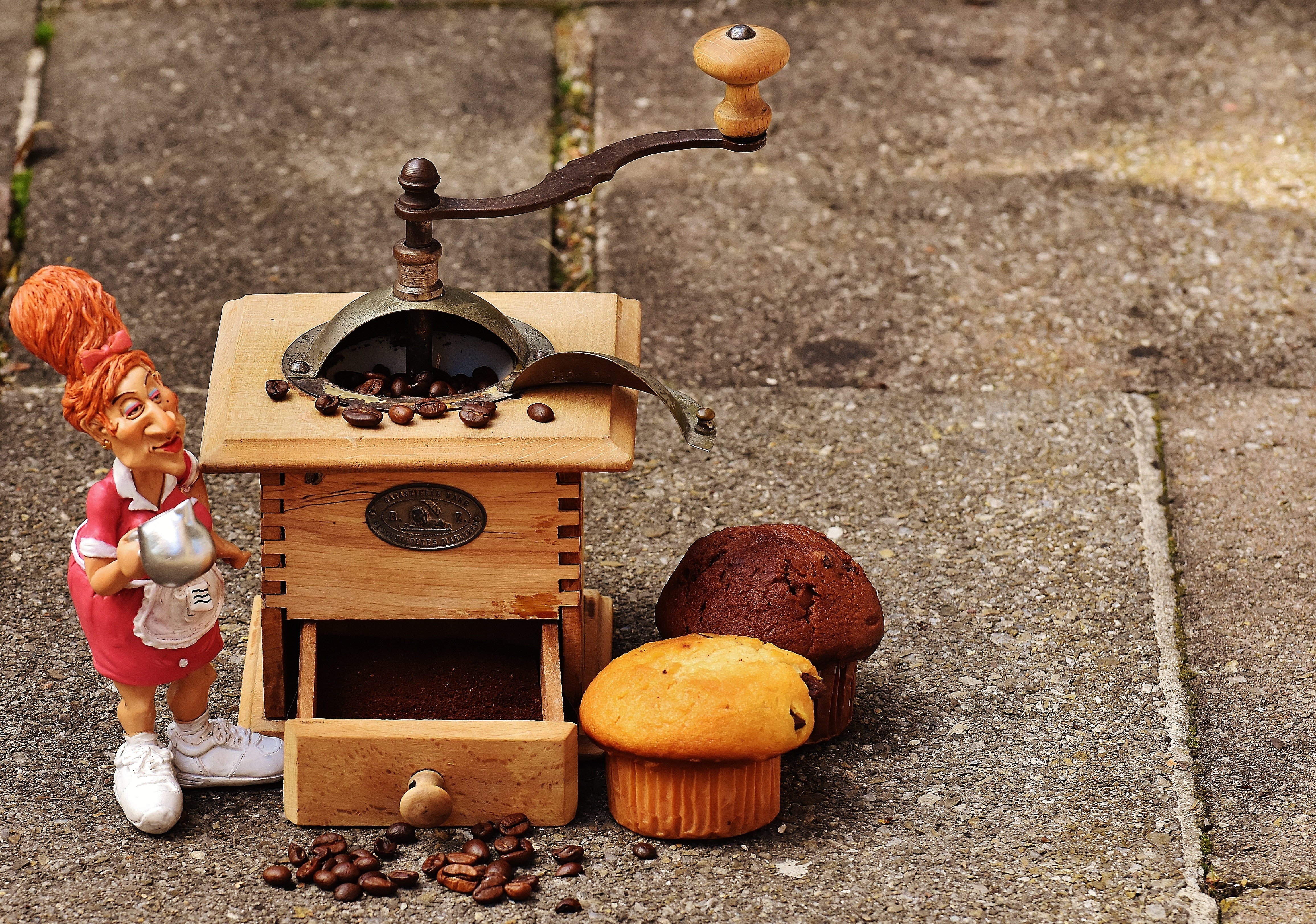 brown wooden coffee grinder