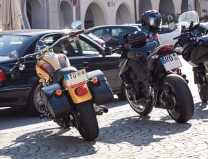 yellow touring motorcycle, black yamaha tsx and black kawasaki bajaj pulsar thumbnail