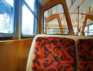red and black chair pad in train thumbnail