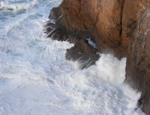 sea waves crashed on hill thumbnail