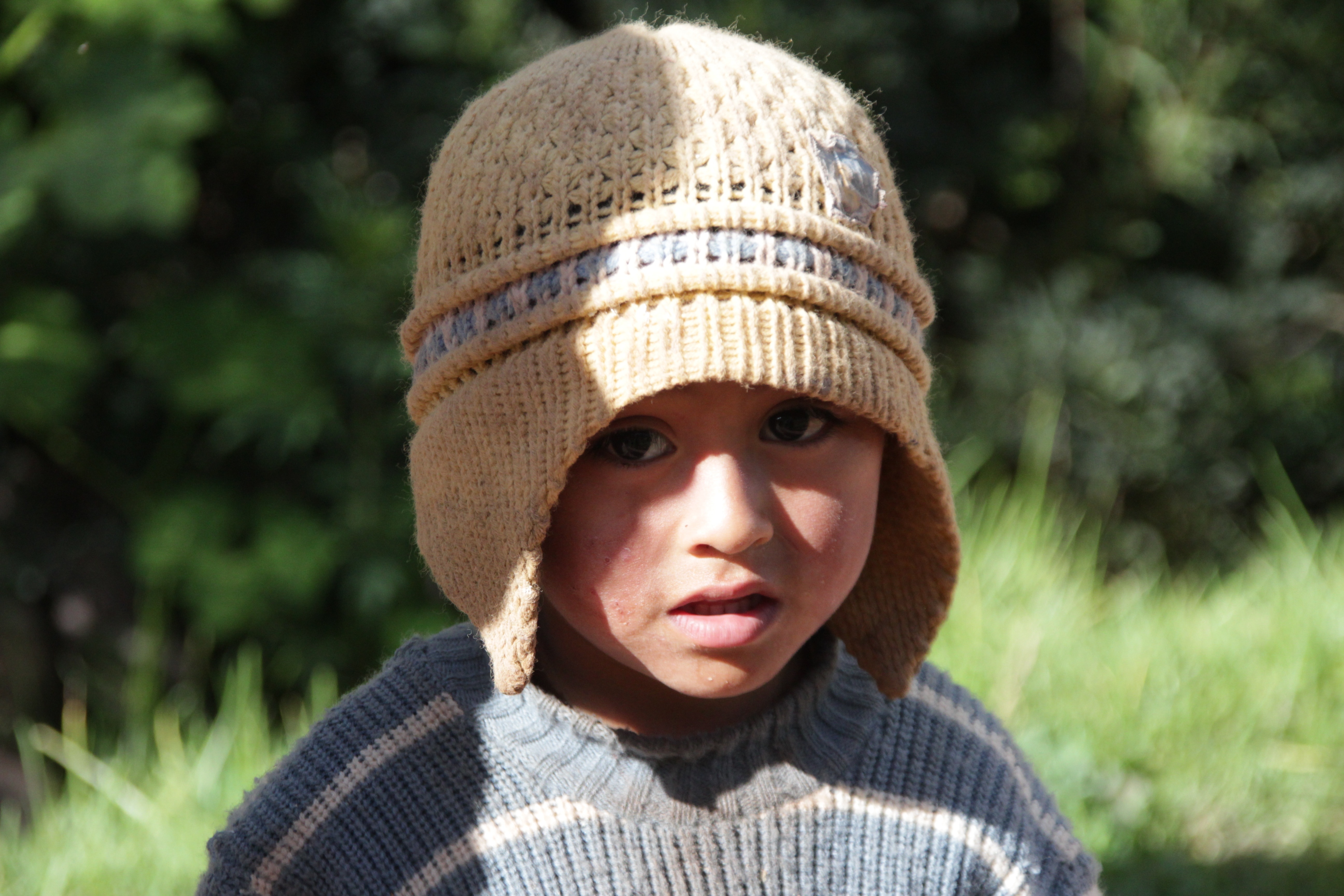 boy's brown and gray knit cap