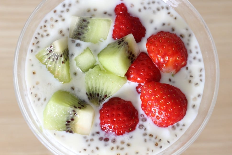 sliced strawberries and kiwis in milk preview