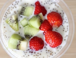 sliced strawberries and kiwis in milk thumbnail
