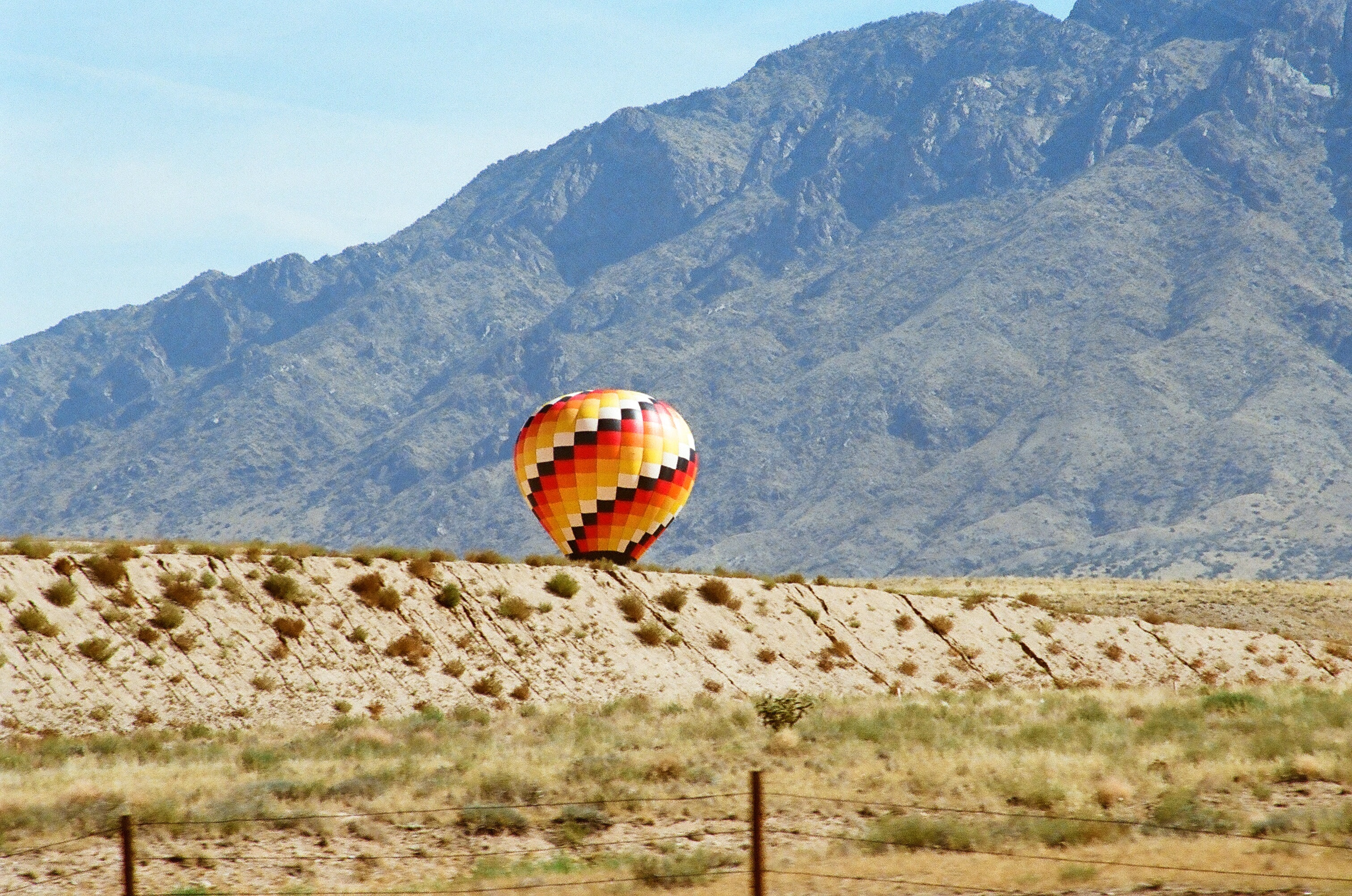 yellow black and red hot air balloon