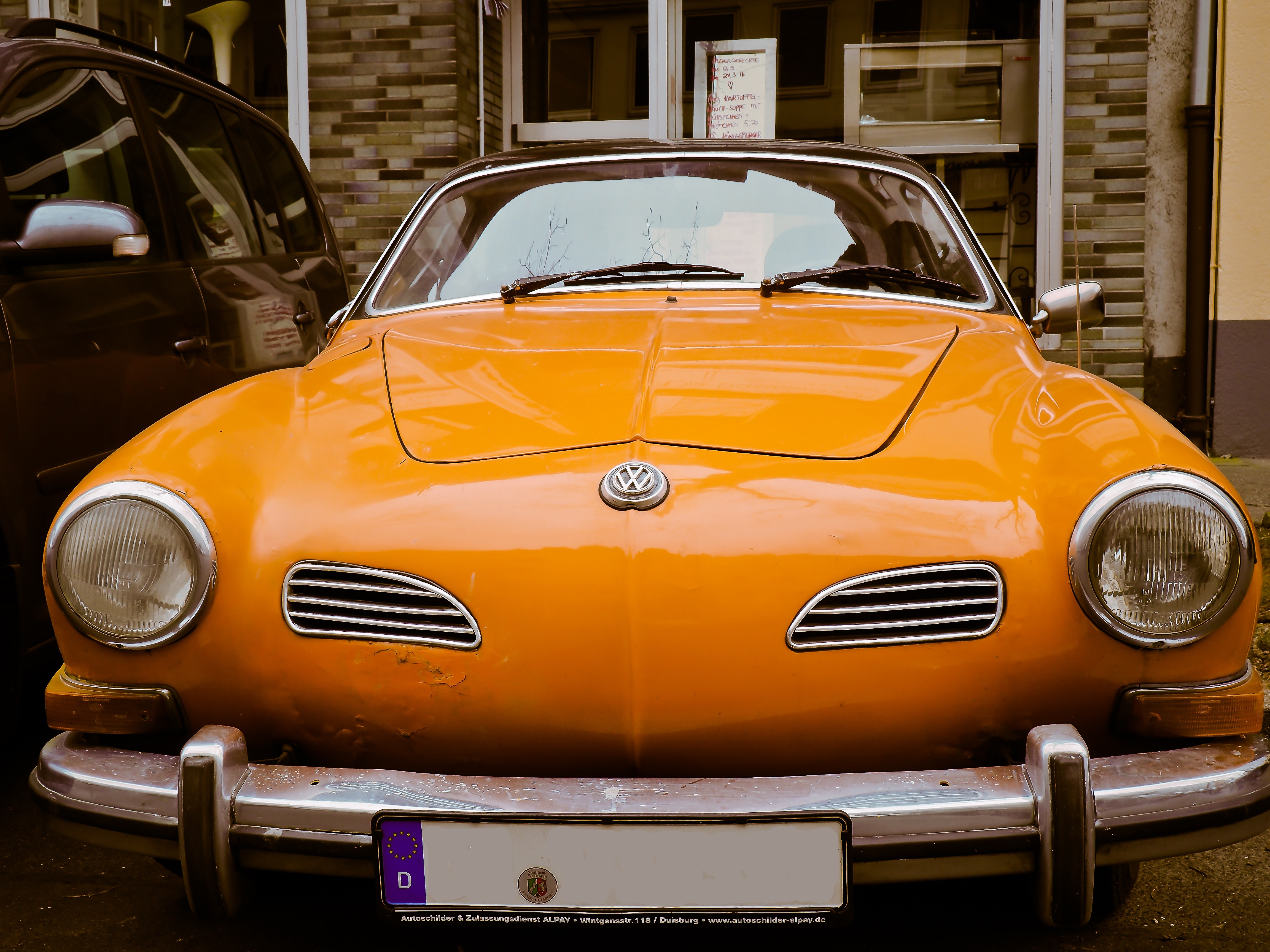 orange volkswagen classic car