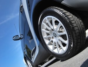 grey car wheel with tore thumbnail
