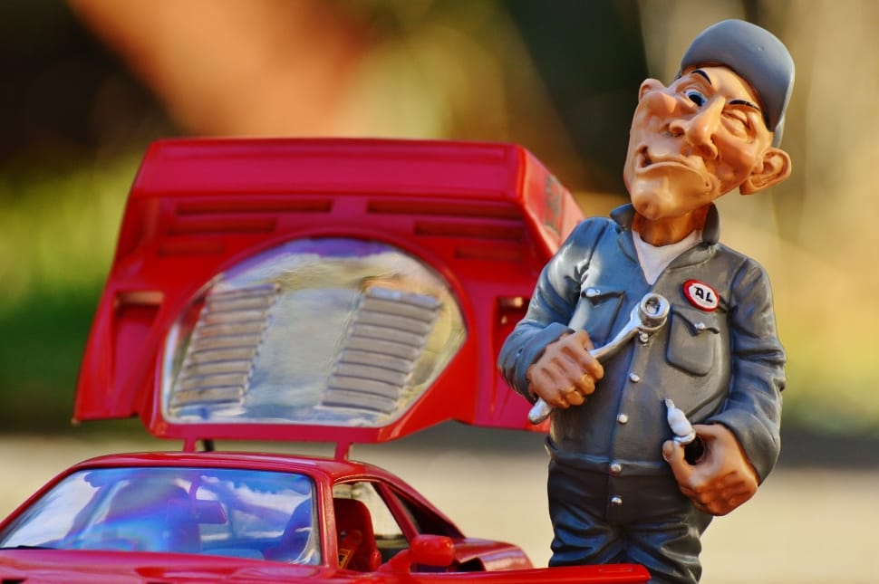 mechanic man holding tool and sports car figurine set preview