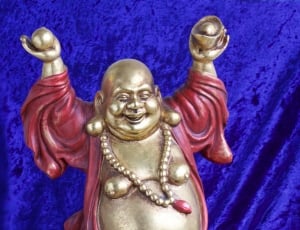 Fig, Deity, Laughing, Sculpture, Buddha, gold colored, statue thumbnail