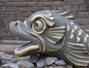 gray and beige fish statue thumbnail