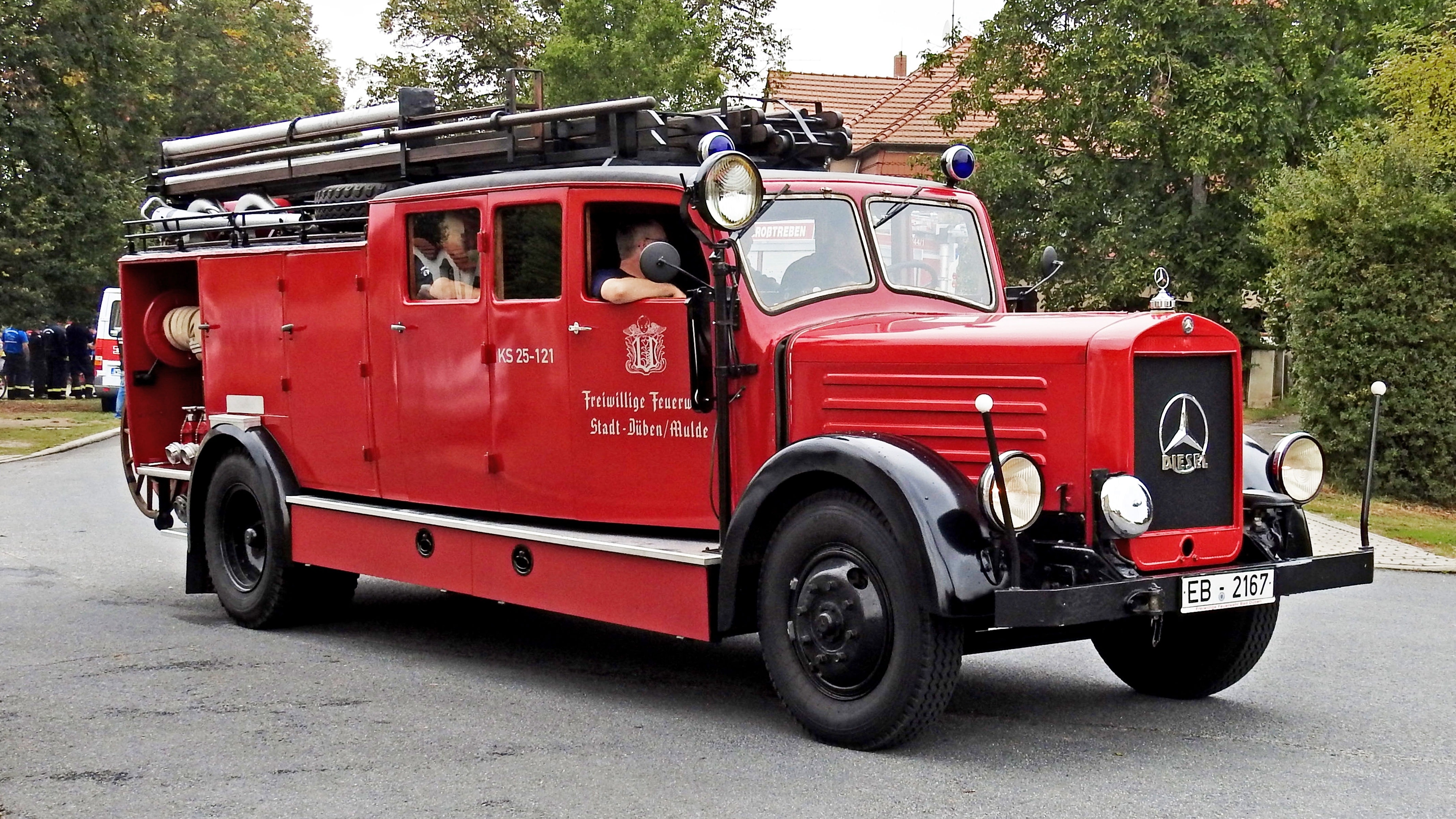 red mercedes benz truck