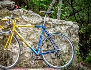 yellow and blue drop bar road bicycle thumbnail