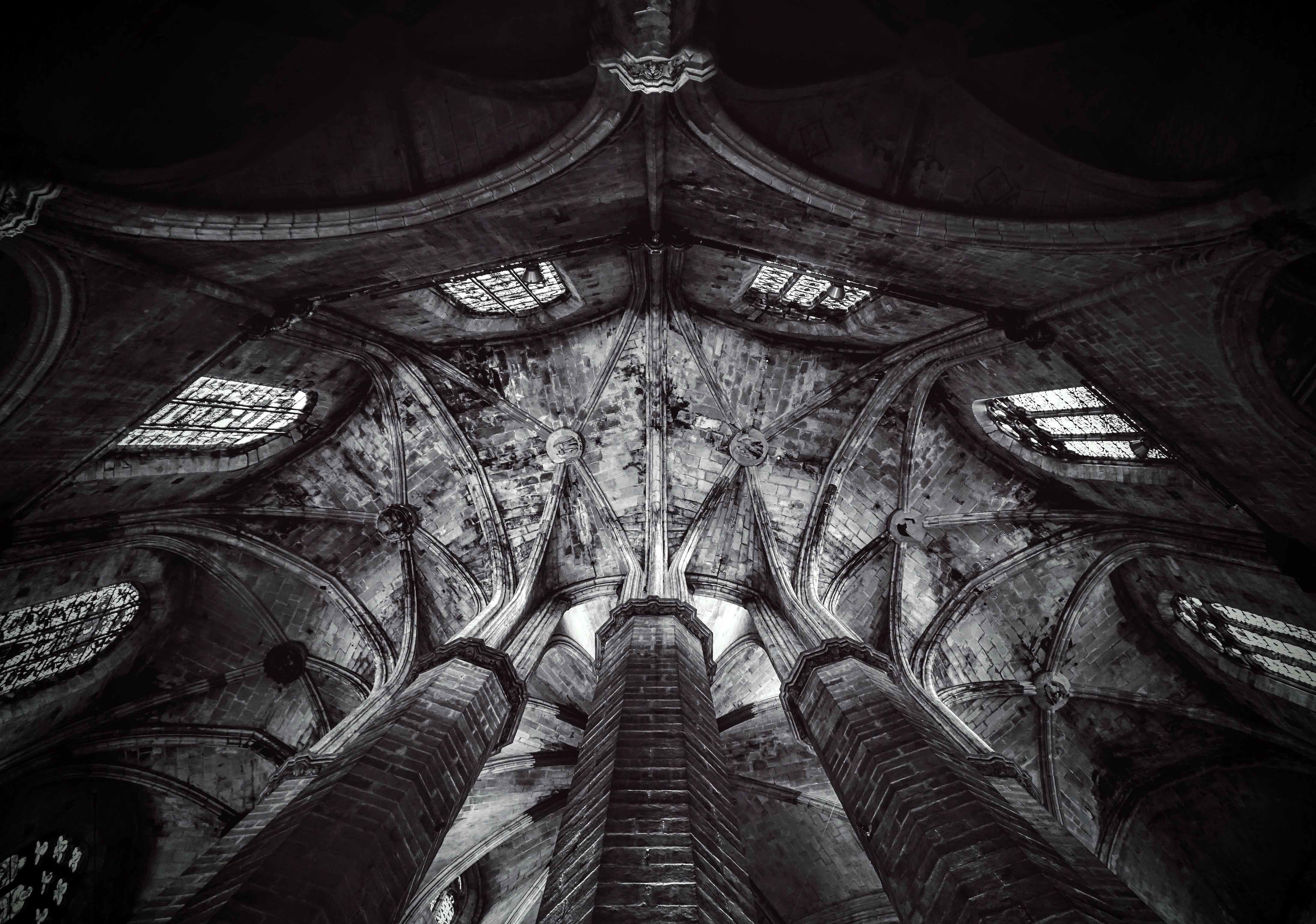 black and white picture of three stone pillars