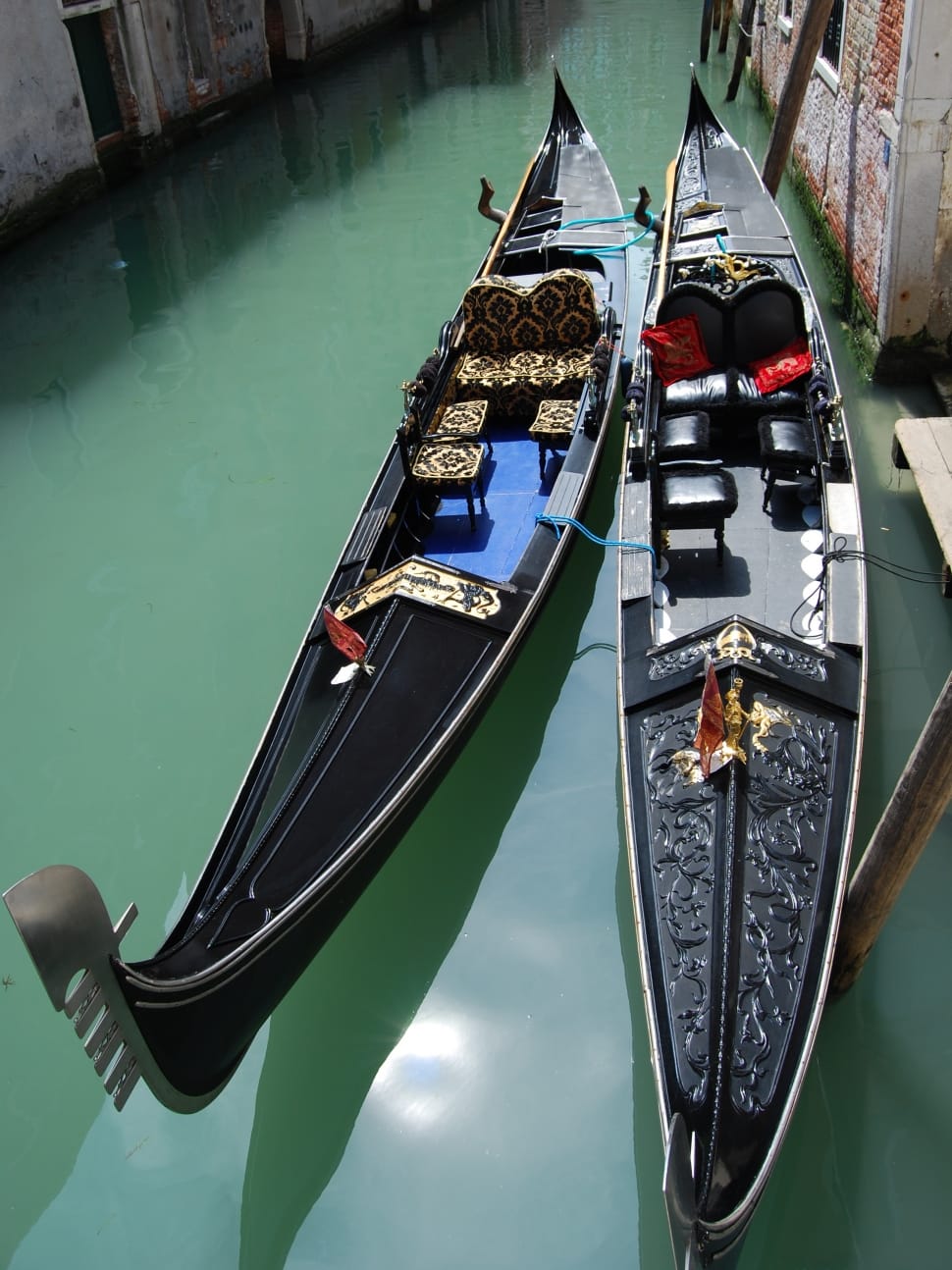 2 black wooden canoes preview