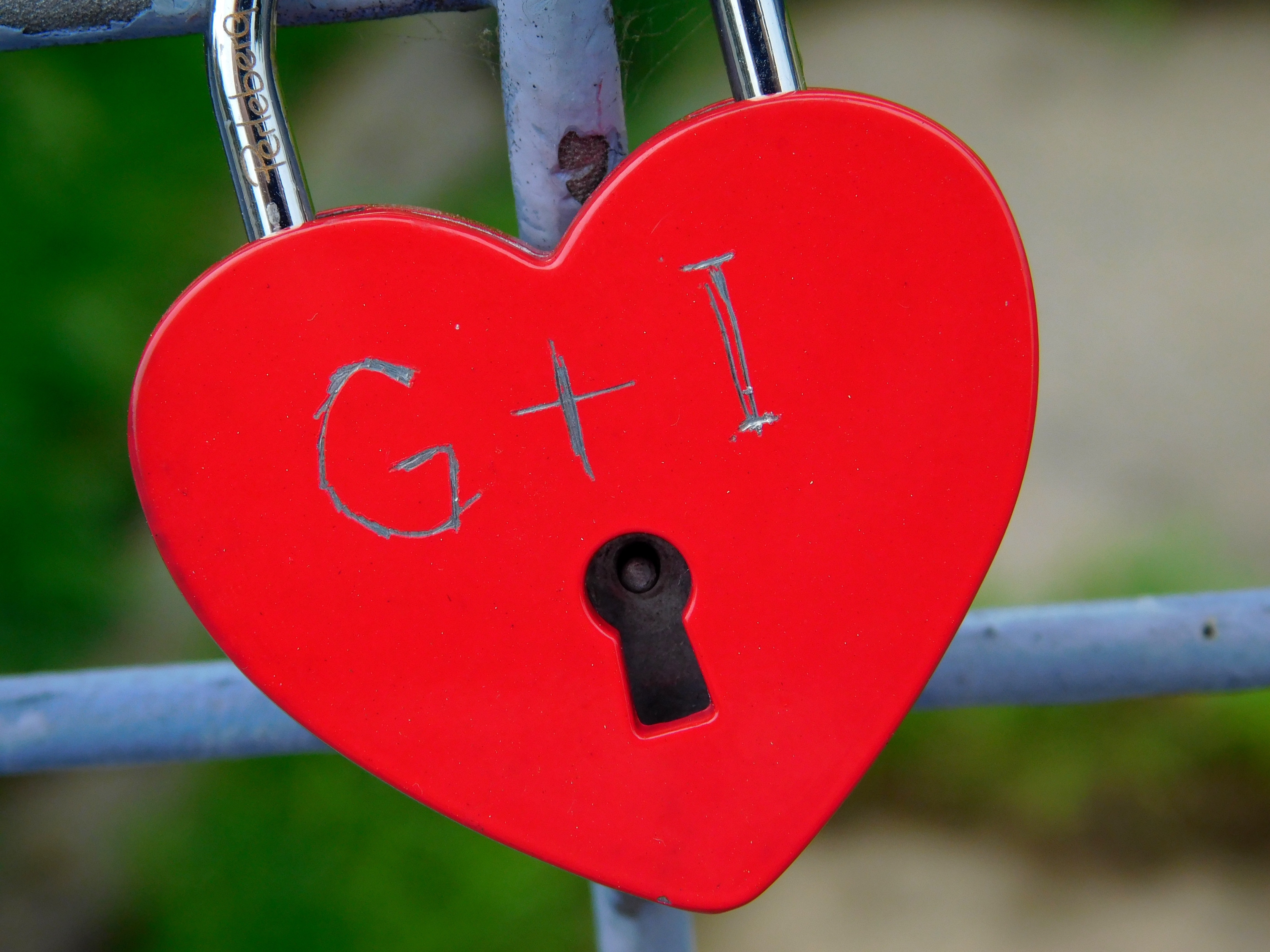red and black heart padlock
