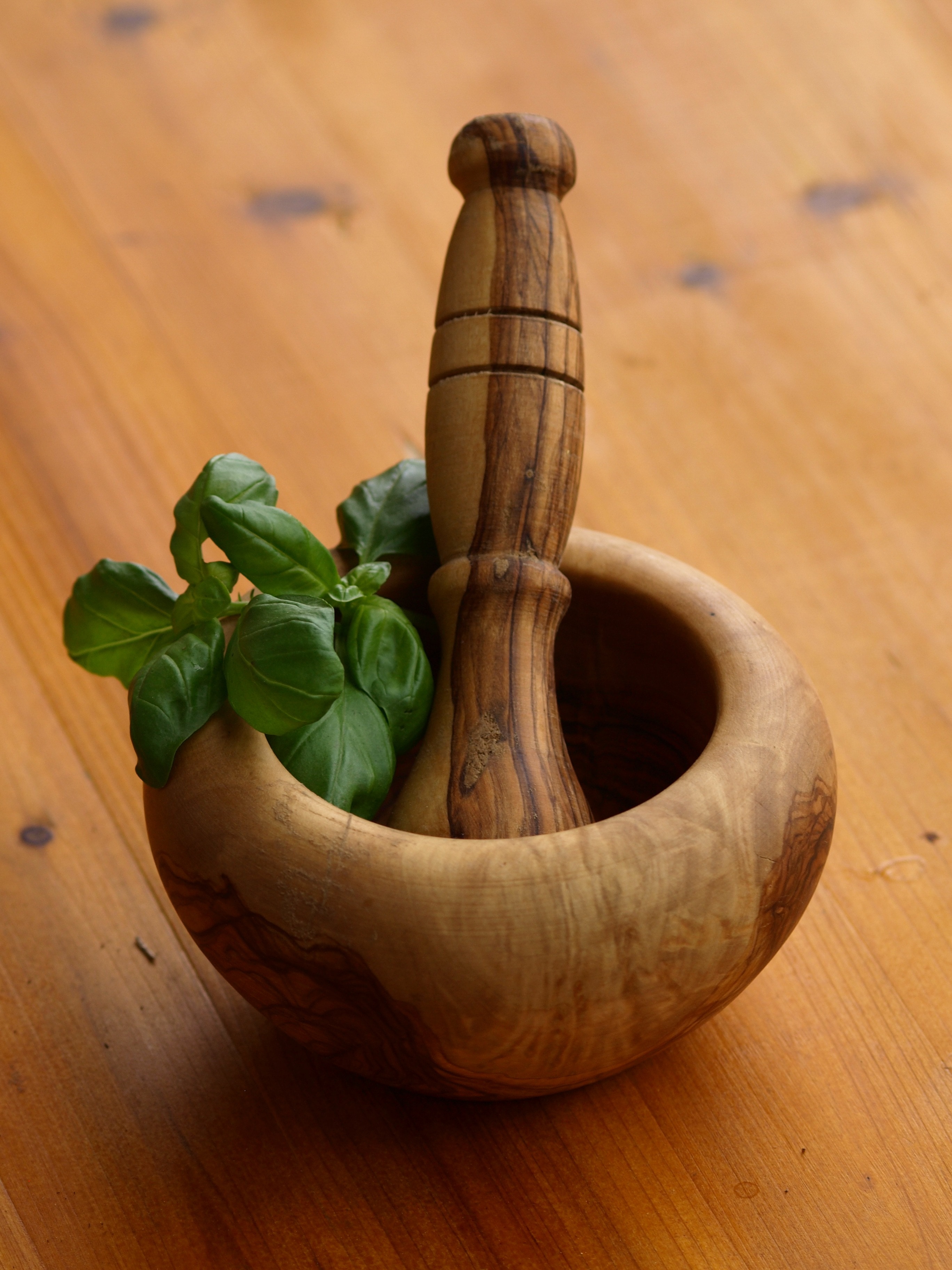 brown wooden mortar and pestle