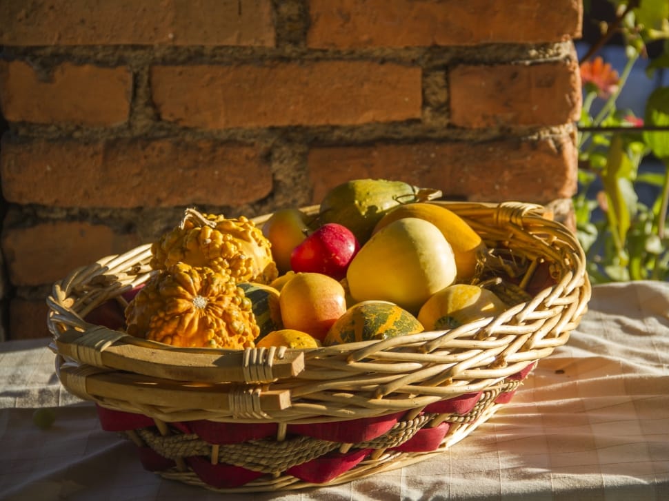 brown wicker basket with yellow gourds preview