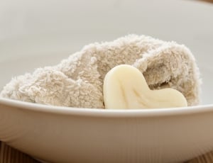 white towel and white heart soap thumbnail