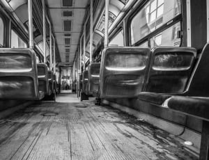 grayscale photography of train interior thumbnail
