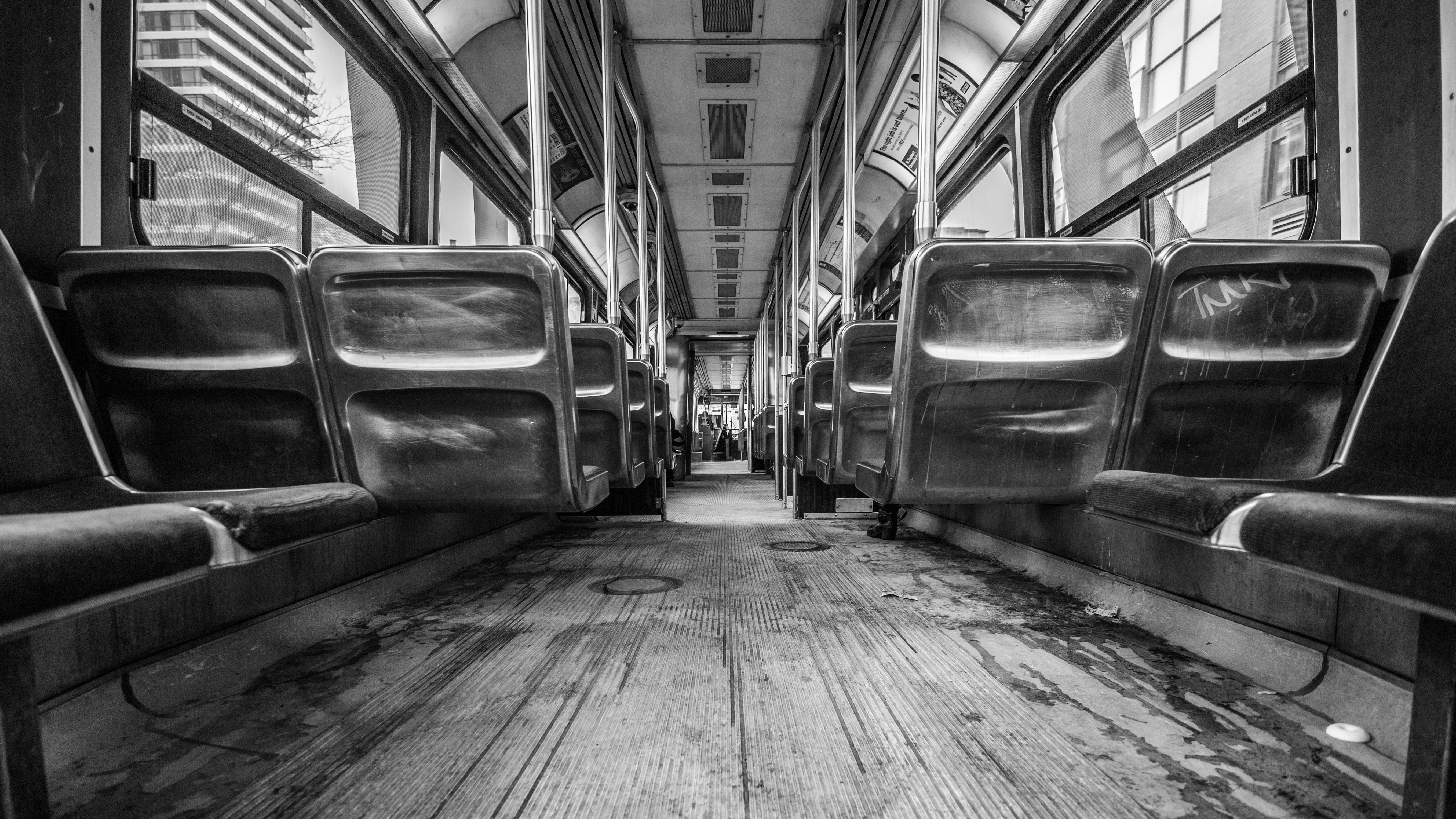 grayscale photography of train interior