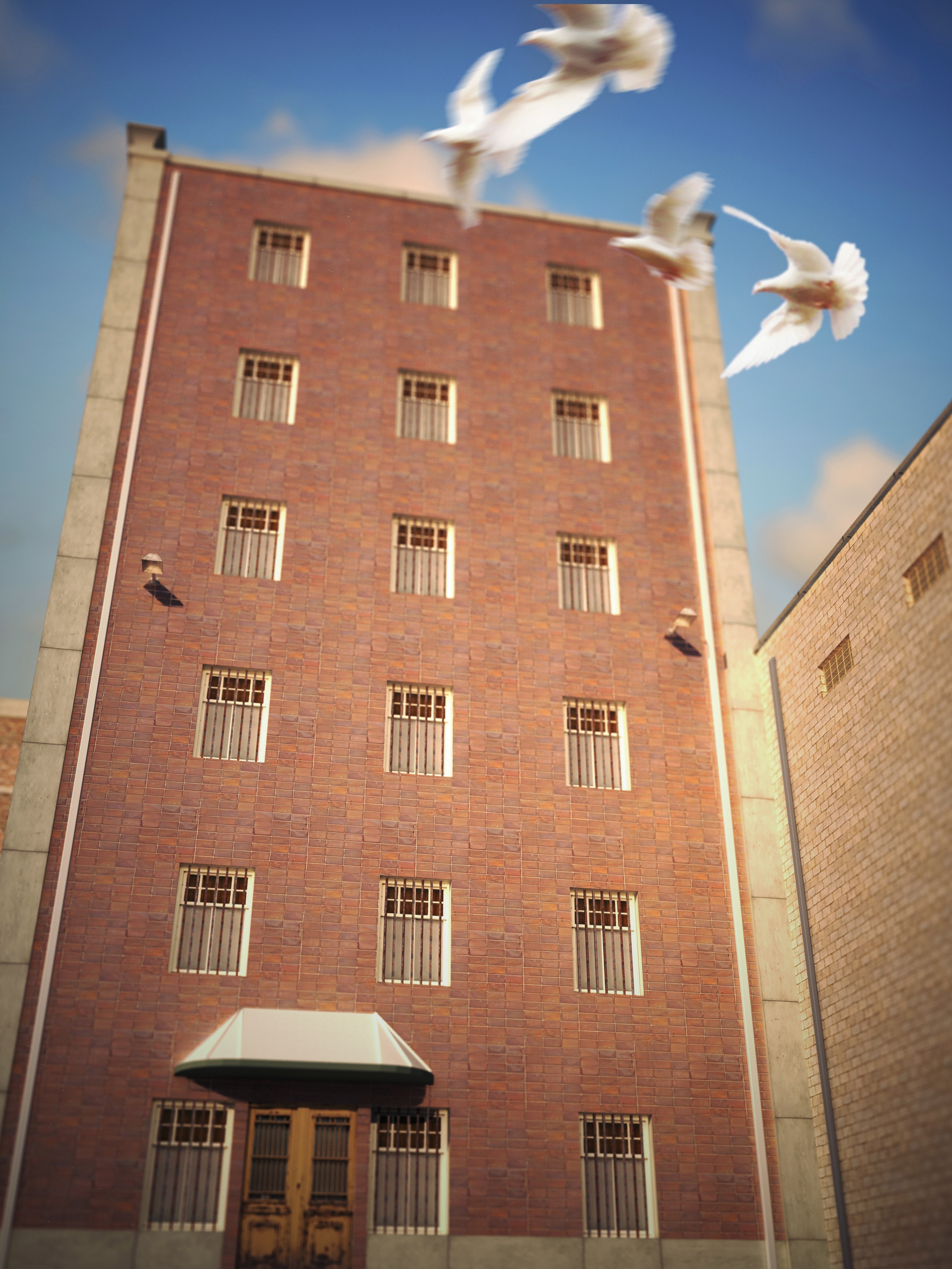 four white pigeons flying near medium rise building