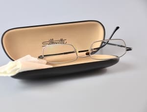 stainless steel eyeglasses frame with clam shell thumbnail