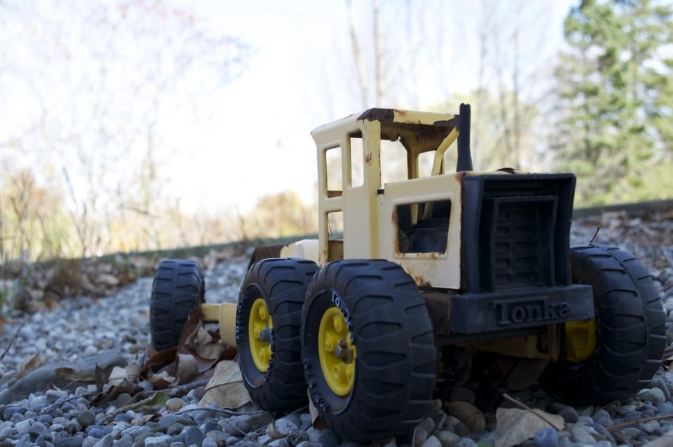 gray and yellow tonka tractor toy preview