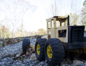 gray and yellow tonka tractor toy thumbnail