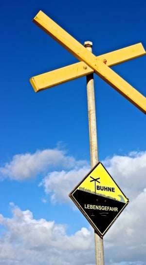 close up of yellow Buhne Lebensgefahr sign thumbnail