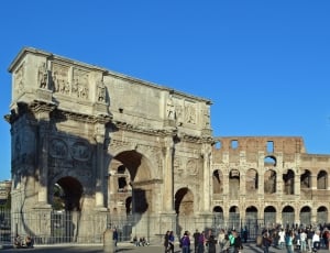 people standing outside The Colosseum during daytime thumbnail