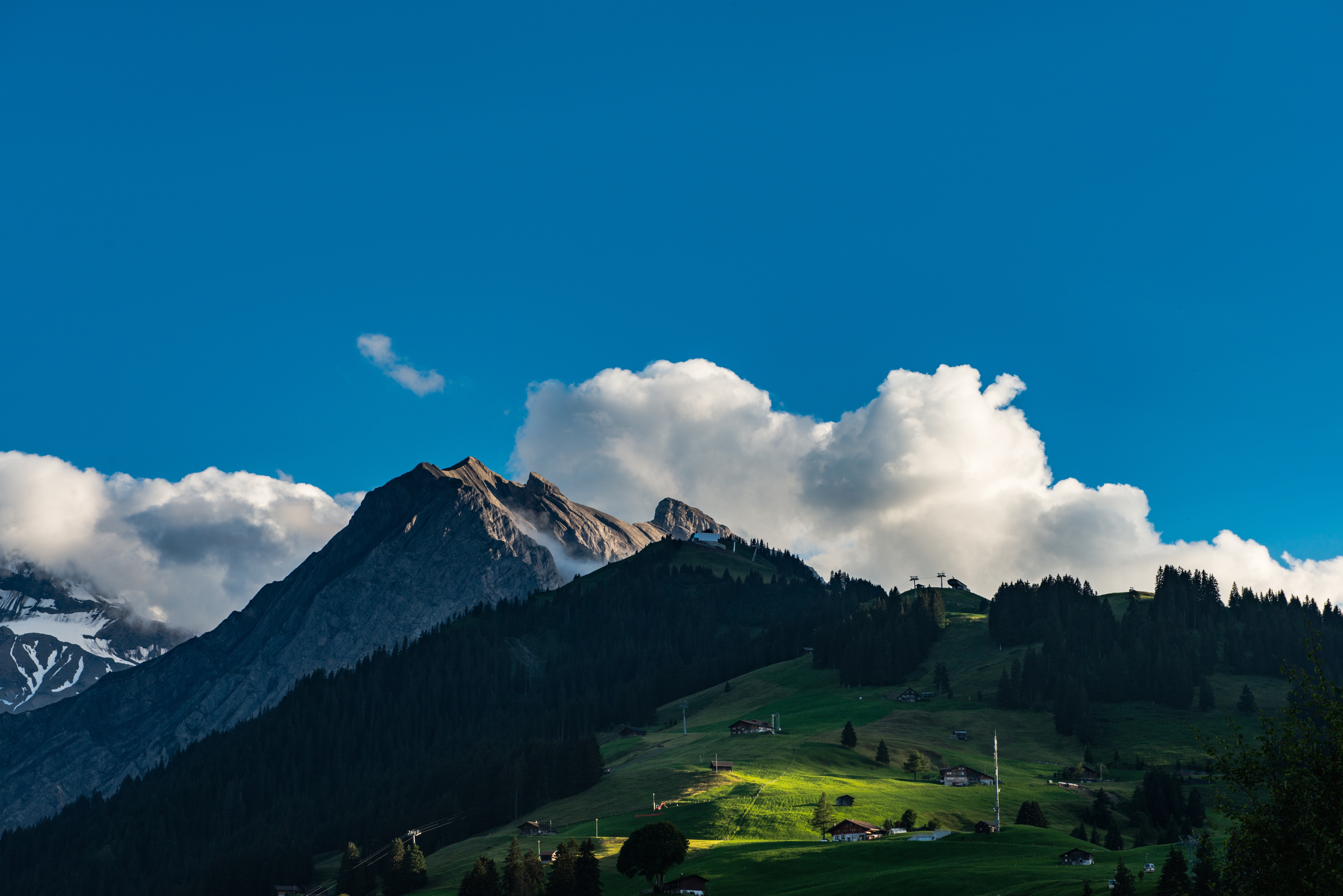 green mountain under clear blue sky during daytie