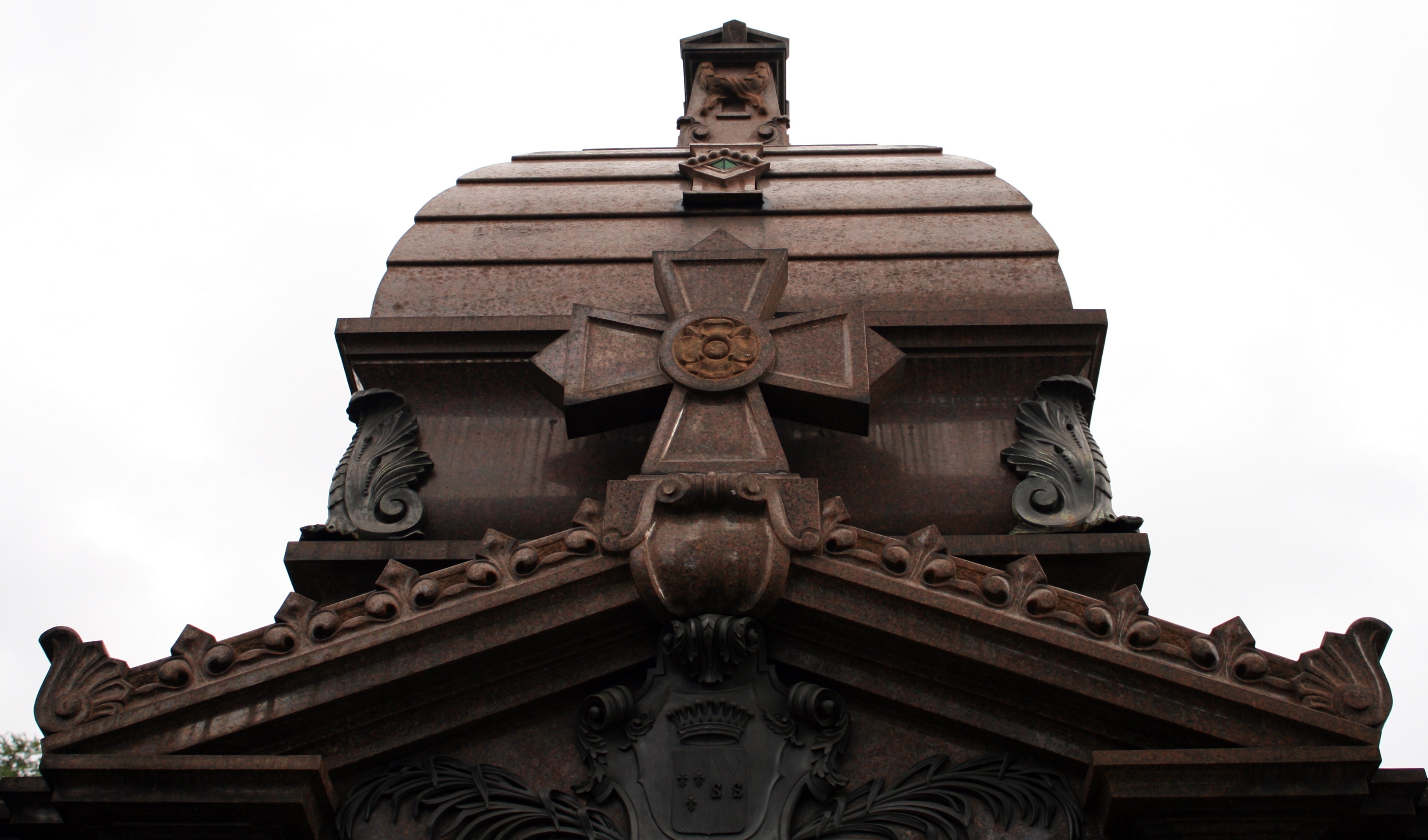 brown concrete cross ornament