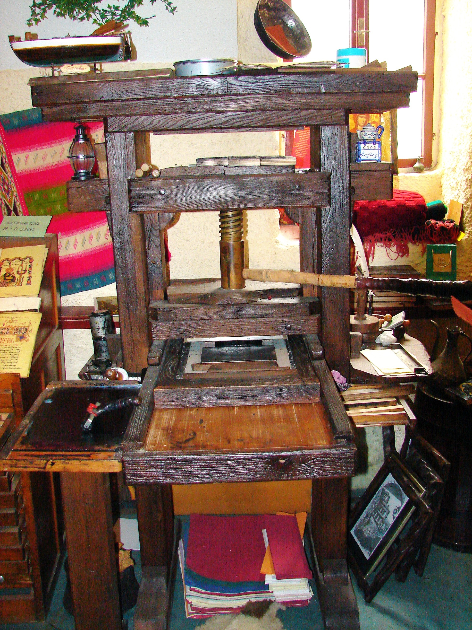 brown wooden press machine