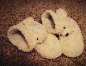 children's pair of white fleece shoes thumbnail