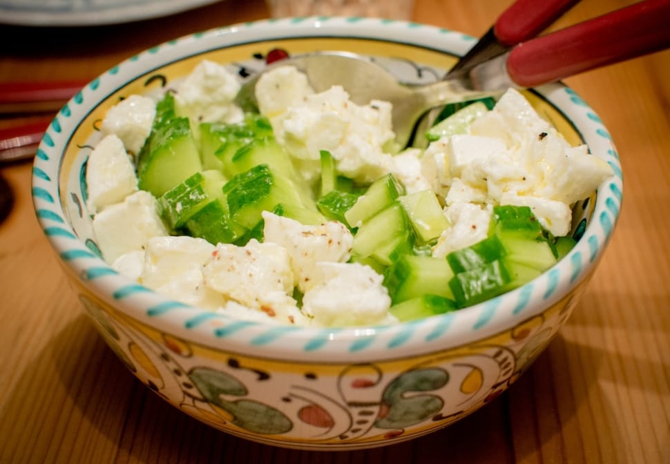 cucumber salad on a bowl with spoon preview