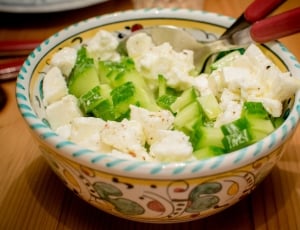 cucumber salad on a bowl with spoon thumbnail