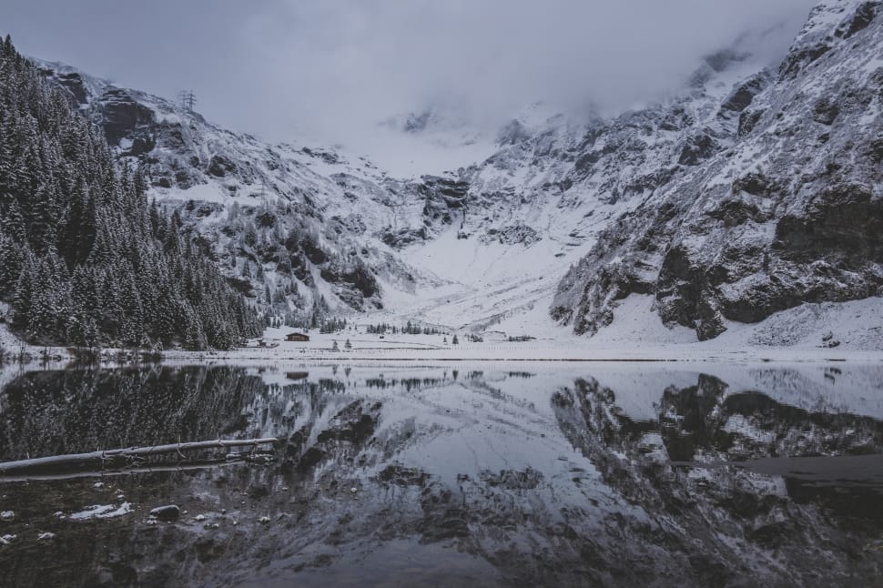 refection photo of snow filled mountains preview