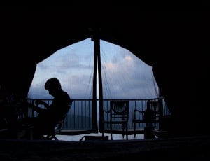 Door, Curtains, Balcony, Person, Sitting, silhouette, full length thumbnail