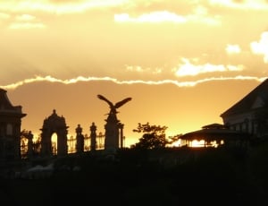 silhouette of building during sunset thumbnail