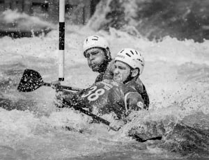 man water rafting in grayscale photo thumbnail